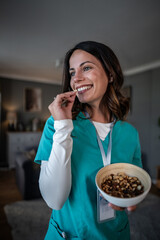 Healthcare worker enjoying healthy snack during wellbeing break