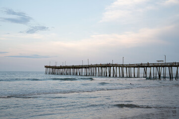 Obraz premium Title: Virginia Beach pier over calm ocean 
