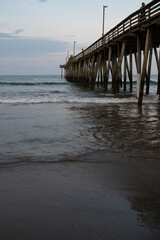 Under the pier at Virginia Beach with ocean waves