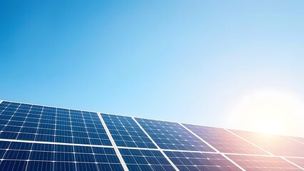 Solar panels under a clear blue sky, representing clean energy and sustainability.