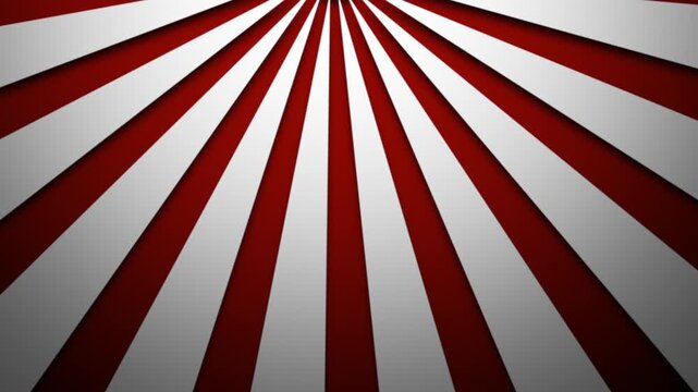 High-contrast red and white rays spinning from the top center of the frame.
