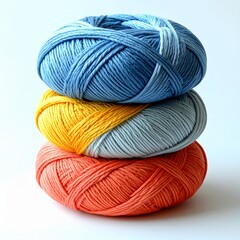 Stacked Blue Yellow and Coral Yarn Balls Crafting Supply Still Life
