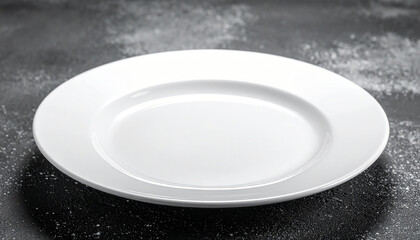 A plain white ceramic dinner plate is positioned on a dark, mottled background dinnerware