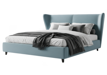 Elegant blue bed with white and gray bedding and throw blanket