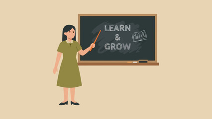 Teacher standing at chalkboard teaching learn grow.