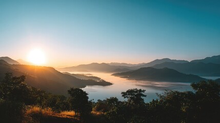 sunrise over mountains with thick sea of mist, calm and serene mood, natural colors, no people 