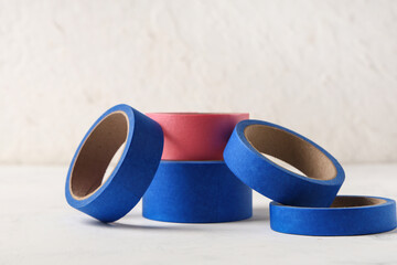 Different masking tape rolls on light background