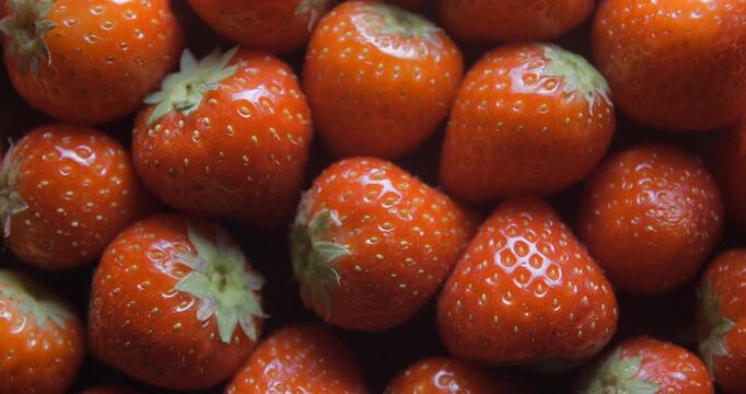 Strawberry close up studio shot over rotating