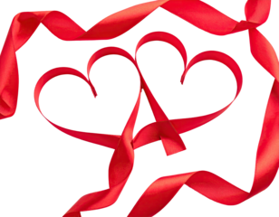 Two red ribbons shaped as hearts, intertwined, on a black background