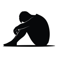 Silhouette of a person huddled in a fetal position illustrating deep sadness despair and emotional distress on white background