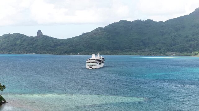 Huahine, French Polynesia. Drone Shot of Cruise Ship in Lagoon of Island