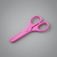 Pink plastic children's safety scissors, closed and positioned on a plain gray background for school or craft projects.
