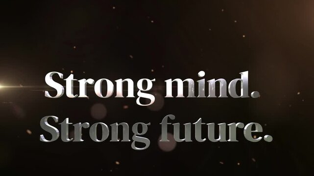 Inspiring motivational quote featuring silver embossed text reading strong mind strong future against a dark background with glowing particle effects emphasizing personal development and resilience