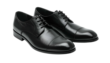 Pair of sleek, black leather dress shoes isolated on a transparent background
