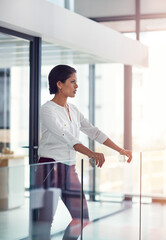 Fototapeta premium Thinking, employee and woman with ambition, office and planning for pr campaign, creative or serious. Publicist, reflection and person with ideas for project, public relations and pride in business