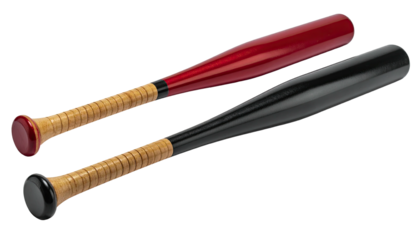 Two wooden baseball bats, one red, one black, resting on a black surface