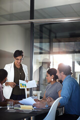 Data, documents and presentation with business woman in boardroom for feedback or report. Meeting, pitch and statistics with employee people in office for proposal or review of charts and graphs