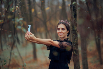 The Evil and Narcissistic Queen Takes Selfies Outdoors. Self obsessed arrogant haughty villain princess taking self portrait