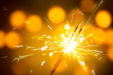christmas sparkler on black background. bengal fire background christmas and new year 's