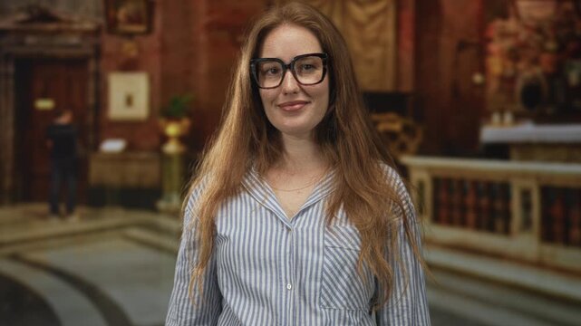 Young caucasian woman holds finger to lips for silence in building; quiet reflection solitude contemplation.