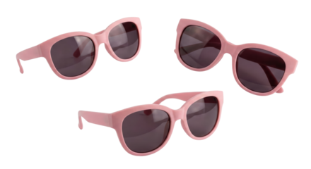 Pair of stylish pink sunglasses with dark lenses isolated on a neutral background overall with a