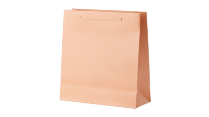 Peach-colored paper shopping bag isolated PNG, blank gift bag for retail, merchandise, or promotional items on transparent background