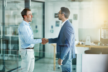 Obraz premium Deal, business men and handshake in office for legal aid, client representation and thank you. Defense attorney, happy person and shaking hands at law firm for case support, advocacy or trial justice