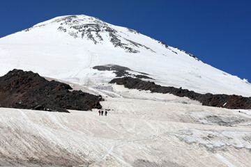 Group People Hiking Snowcovered Peak