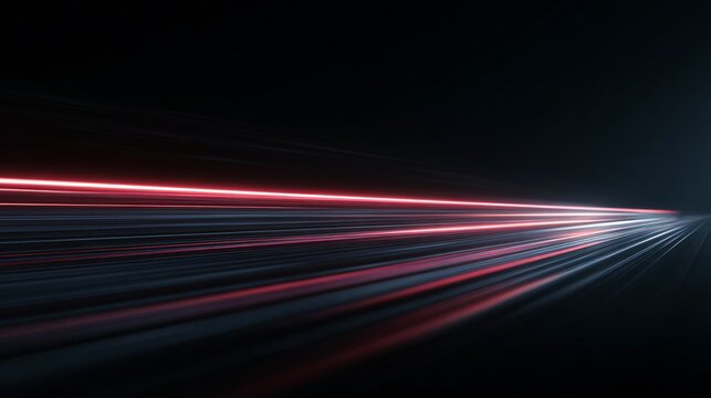 Abstract light trails on a dark background suggesting speed or movement.