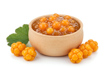 wooden bowl filled with cloudberry jam and fresh cloudberries with green leaf