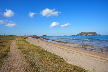 seaside walkway and charming clouds
