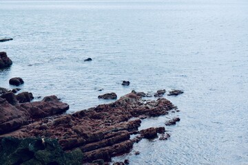 rocks in the sea in greece