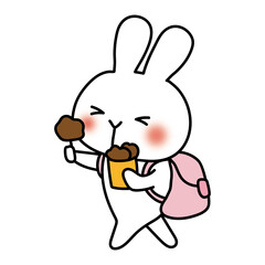 食べ歩きをする白いうさぎ