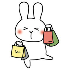 たくさんの買い物をしている白いうさぎ