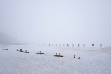Snowy landscape with chairs