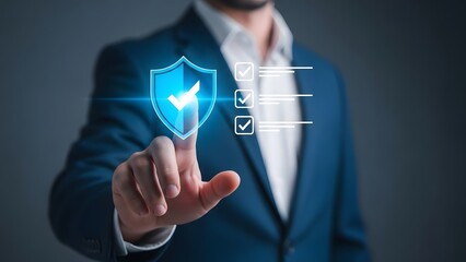 Businessman interacting with virtual security shield and settings icon on hand