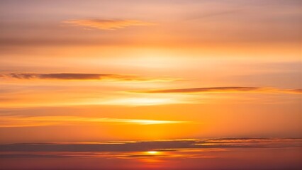 Fototapeta premium Warm sunset sky with orange gradient over horizon