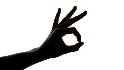 Obraz premium Silhouette of a hand forming the ok sign against a white background