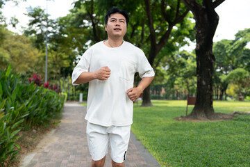 Asia man run in the park