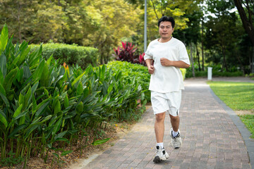 Asia man run in the park