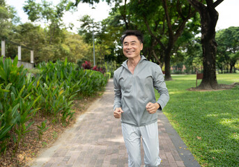 Asia elderly man run outdoor