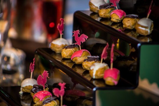Culture of Faith, decorative dessert food shot at Chinese New Year Tradition show event with symbols and signs, shot is selective focus with shallow depth of field. Photo taken at Cairo Egypt