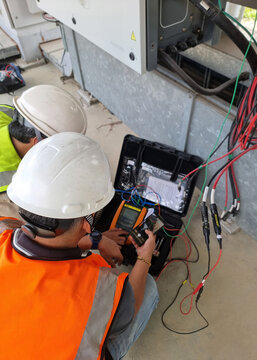 DC cable  insulation testing at inverter terminal by electrical engineer team for solar farm system.