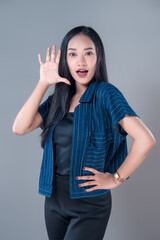 Indonesian Woman Smiling with One-Hand Open Gesture