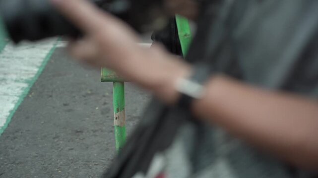 Closeup of feet playing bamboo stilts at a festival in Yogyakarta. Bamboo stilts are a traditional Indonesian game.