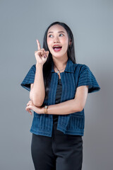 Asian Woman Having an Idea With Raised Index Finger