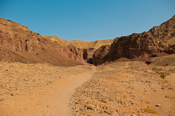 Naklejka premium View of rocky landscape in the desert of Israel, sandstone cliffs and desert. Israel. Eilat.