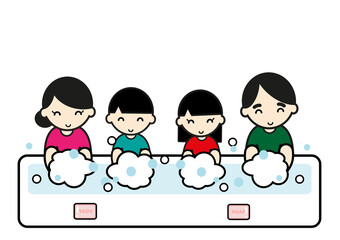 笑顔で手を洗う家族