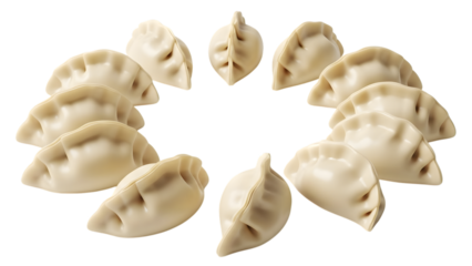 Freshly made white dumplings arranged in a circular pattern on a dark surface isolated on a transparent background