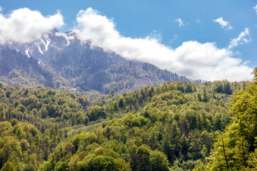 Mountain range with a cloudy sky